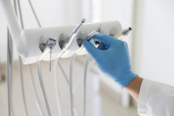 Professional Tooth Extraction technician working in Metairie, LA